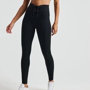 Year of Ours Black Ribbed Football Leggings.